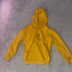 Orange hoodie with rose flower print in middle